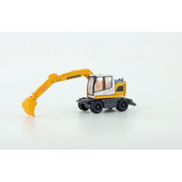 Pelle mécanique sur pneus Liebherr compact, jaune Pelle mécanique sur pneus Liebherr compact, jaune