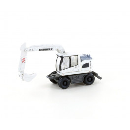 Pelleteuse mécanique Liebherr compact, blanche Pelleteuse mécanique Liebherr compact, blanche