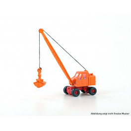 Excavatrice Fuchs F 301 orange et rouge avec bras en treillis. Excavatrice Fuchs F 301 orange et rouge avec bras en treillis.