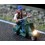 168111 - Motocycliste en scooter en veste et bonnet